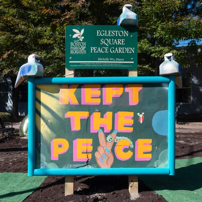 sign at the park that says "kept the peace" 