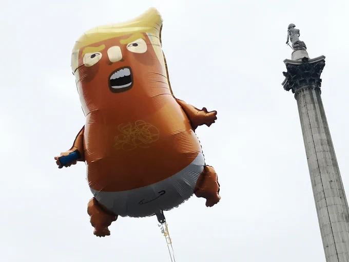 A Trump baby balloon in front of Nelson's Column