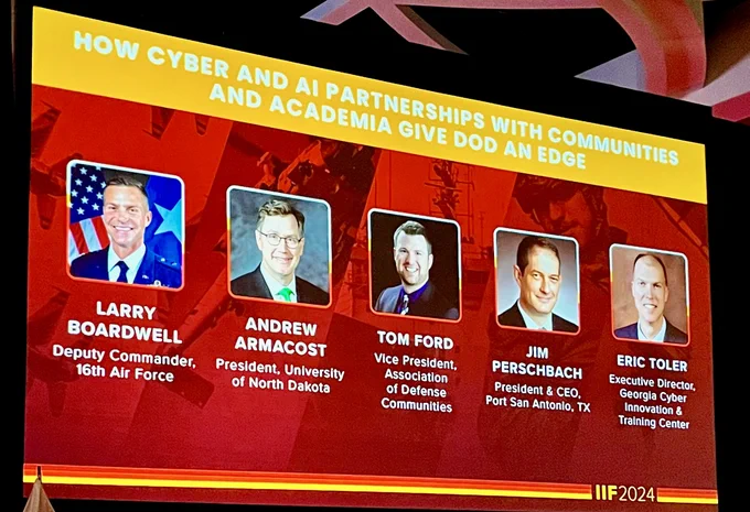 Presentation slide titled 'How Cyber and AI Partnerships with Communities and Academia Gives DoD an Edge' featuring four individuals: Larry Boardwell, Deputy Commander, 16th Air Force; Andrew Armacost, President, University of North Dakota; Tom Ford, Vice President of Defense Communities; Jim Perschbach, President & CEO, Port San Antonio, at the IIF 2024 event.