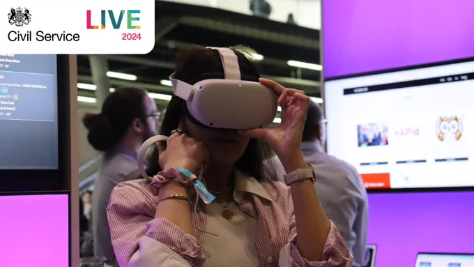 A civil servant attendee watching a VR demo at Civil Service Live. 