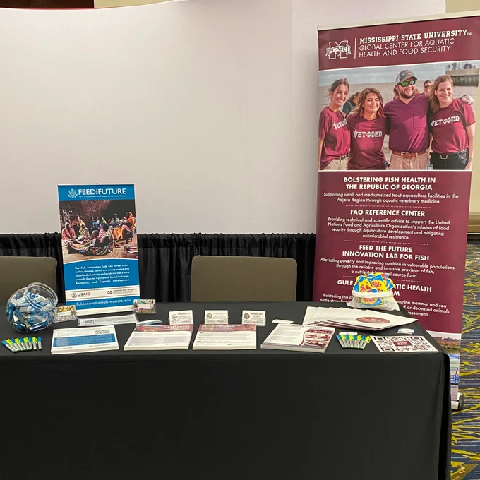 the Global Center for Aquatic Health and Food Security booth at the 2024 Borlaug Dialogue
