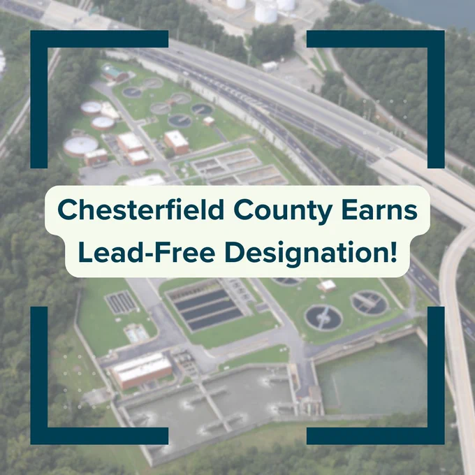 Aerial view of a water treatment plant with the text overlay "Chesterfield County Earns Lead-Free Designation!" framed by blue borders.