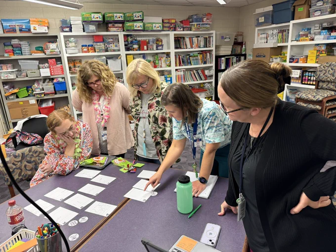 Teachers discussing student work