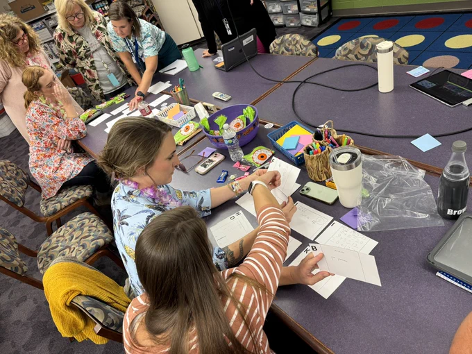 Teachers discussing student work