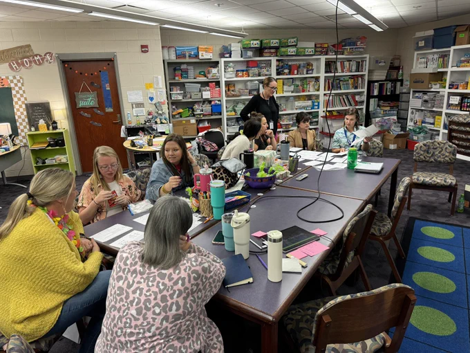 Teachers discussing student work
