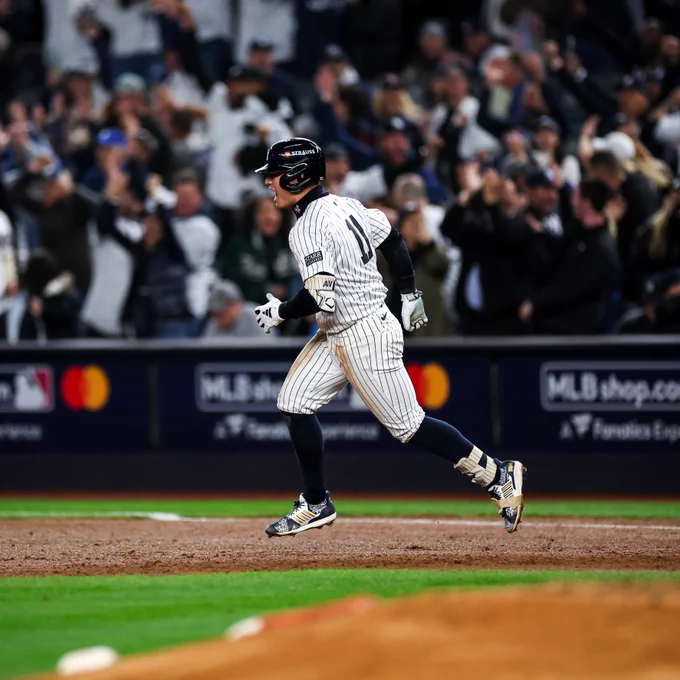 Volpe yells as he round 1st base after hitting a grand slam. 