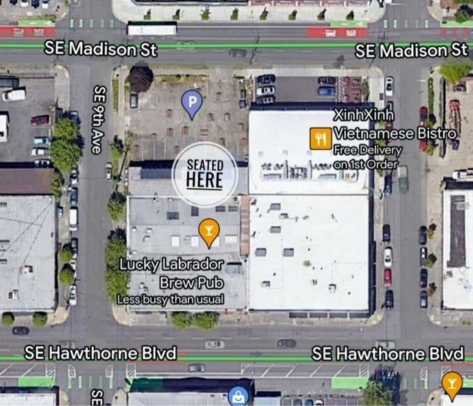 A map showing where the group is seated: under the non smoking section of the covered patio, closer to Madison St.