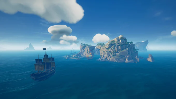 A Galleon sails on a blue sea towards an island. 