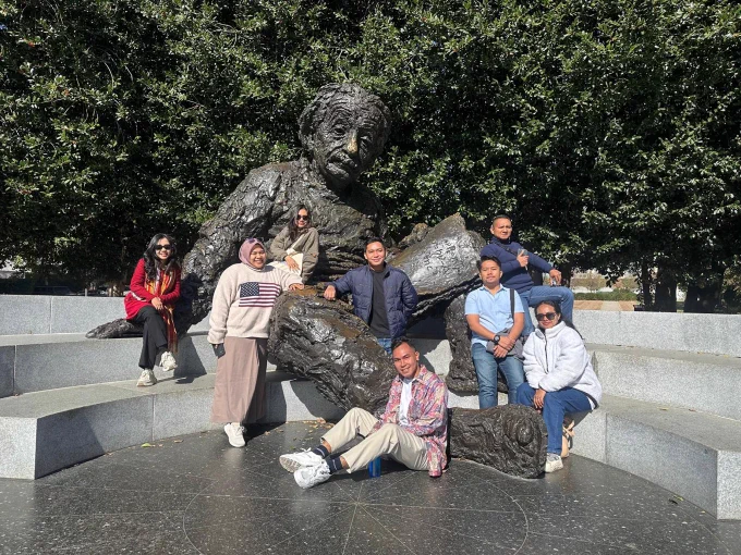 Indonesian participants of the U.S. Department of State's International Visitor Leadership Program (IVLP) pose for a group photo at the Albert Einstein Memorial in Washington, DC in October, 2024.