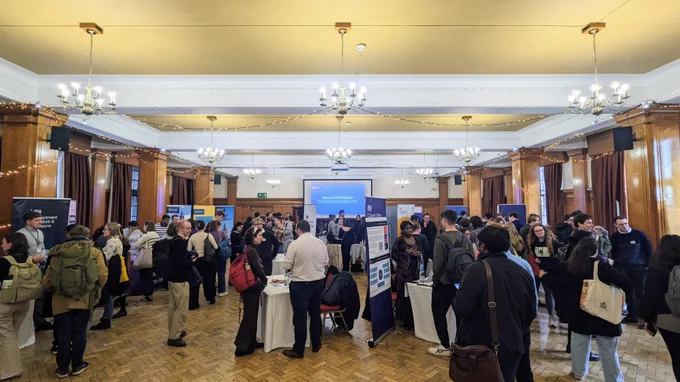 Students speaking to Civil Service staff at the Civil Service Careers Fair in the Glasgow University Union Dining Room