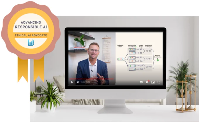 computer with video of a diagram and Ben talking. Overlayed is a badge that says Ethical AI Advocate