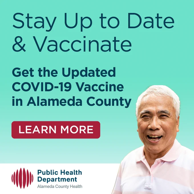 Smiling older Asian man wearing a light pink polo shirt against mint green background. The text reads "Stay Up to Date & Vaccinate. Get the Updated COVID-19 Vaccine in Alameda County. Learn More". Logo: Alameda County Public Health