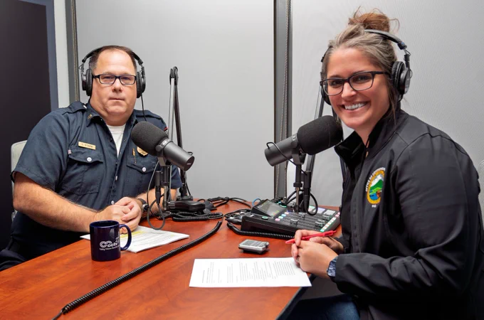 Contra Costa County Fire Protection District Deputy Chief Chuck Stark (left) and Contra Costa County Office of Communications & Media Director Kristi Jourdan (right) at the Contra Costa Television Podcast Studio in Martinez, California.