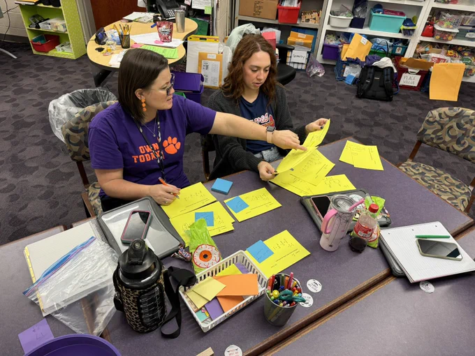 Teachers with student work