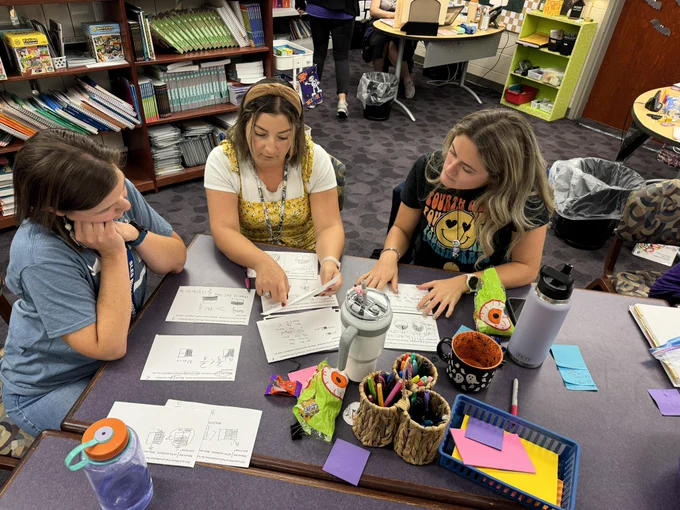 Teachers with student work