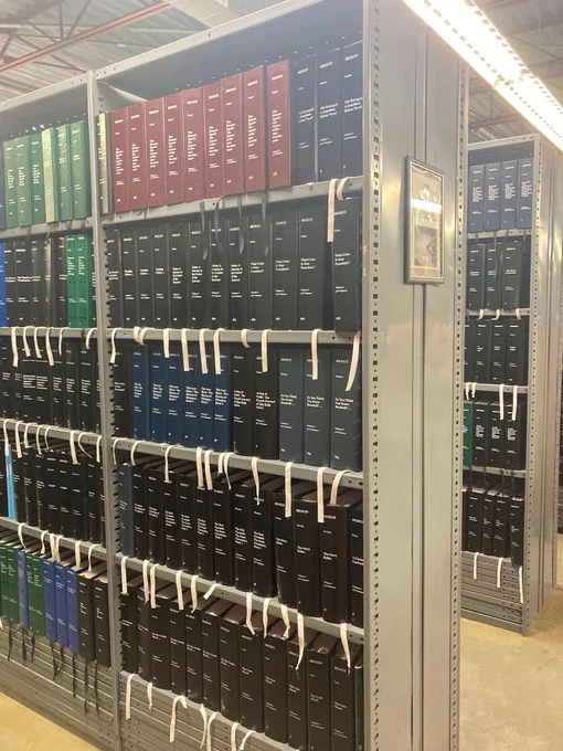 A library shelf full of Braille books.