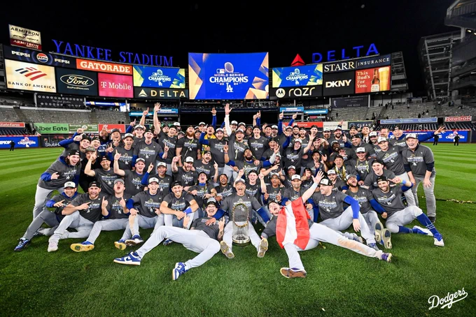 A group photo of the 2024 World Series champions on the field.