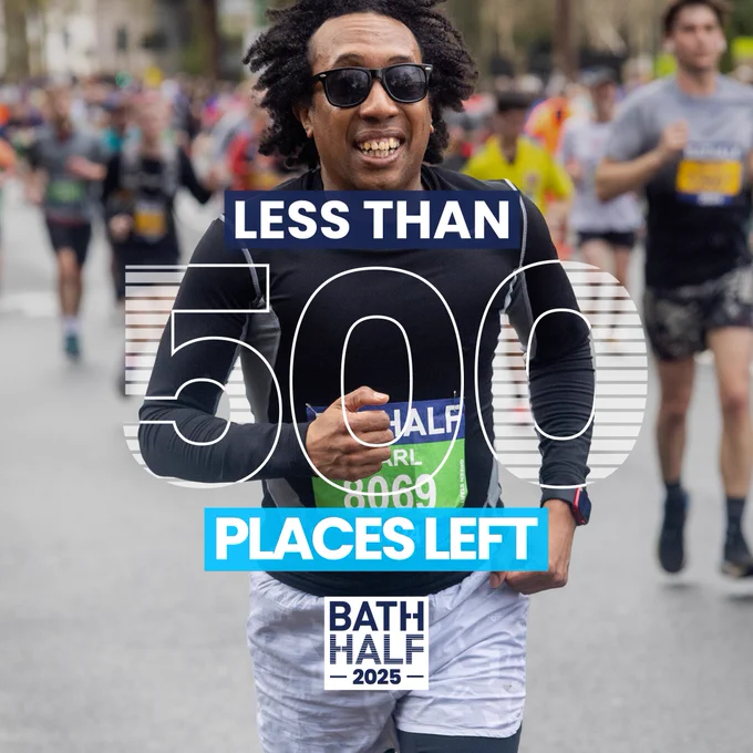 An enthusiastic runner participates in the Bath Half Marathon 2025, surrounded by other participants in the background.

There is text overlaid the photo of the runner that reads "LESS THAN 500 PLACES LEFT".

The Bath Half logo is in the bottom centre of the asset.