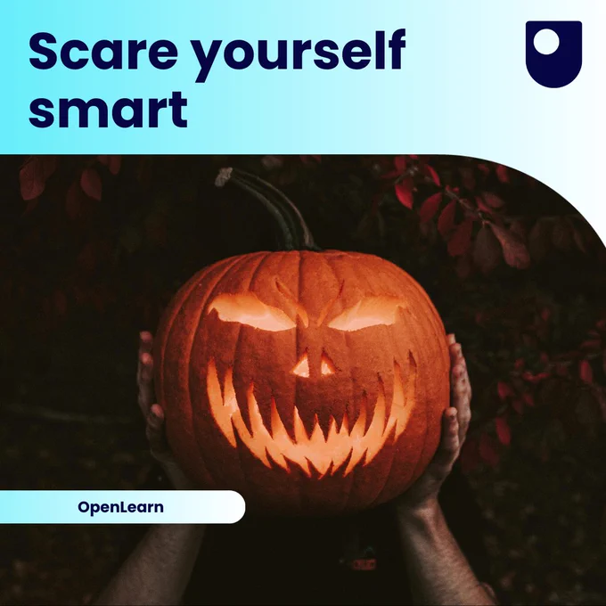 A Halloween-themed image featuring a carved pumpkin with a menacing smile and glowing eyes, held up by hands in a dark outdoor setting with leaves in the background. The top of the image has the text "Scare yourself smart" in bold, dark letters, along with The Open University logo. At the bottom, a blue banner with "OpenLearn" is displayed.