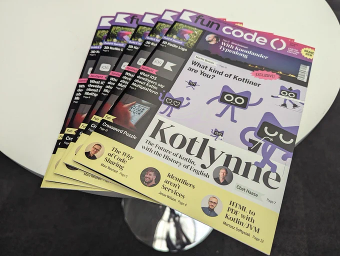 A few copies of the fun code() magazine lying on a table at Droidcon London.