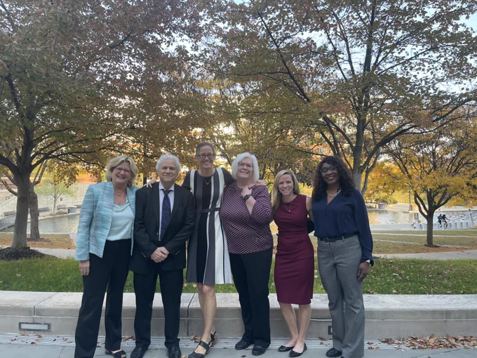 Indiana CTSI leaders pose with NCATS colleagues on the IU Indianapolis campus.