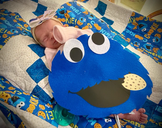 NICU baby dressed as Cookie Monster