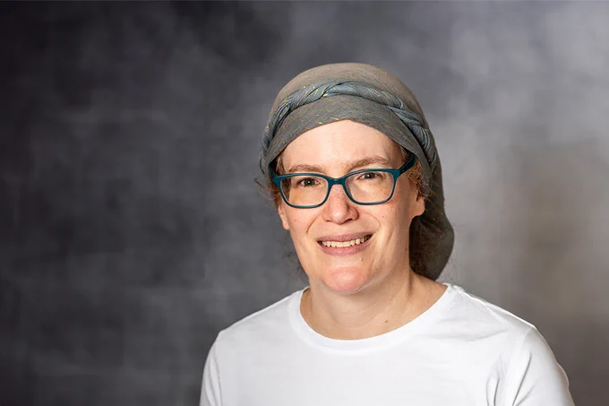 Rachel Mandelbaum smiles at the camera.