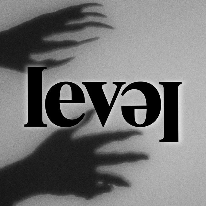 The Level Centre logo in black sits in the centre of the screen. Some spooky monster hands reach towards it on a grey background.