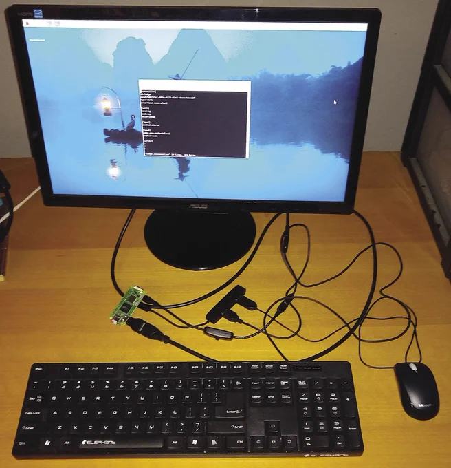 The Raspberry Pi Zero 2 W connected to a monitor, keyboard and mouse for development.
