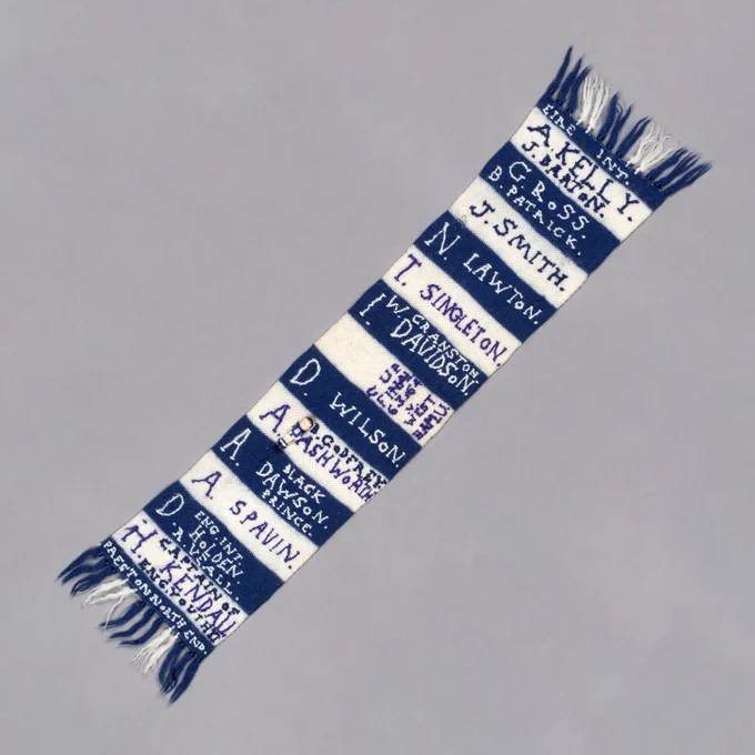 A photograph of a blue and white Preston North End scarf from the 1960s.