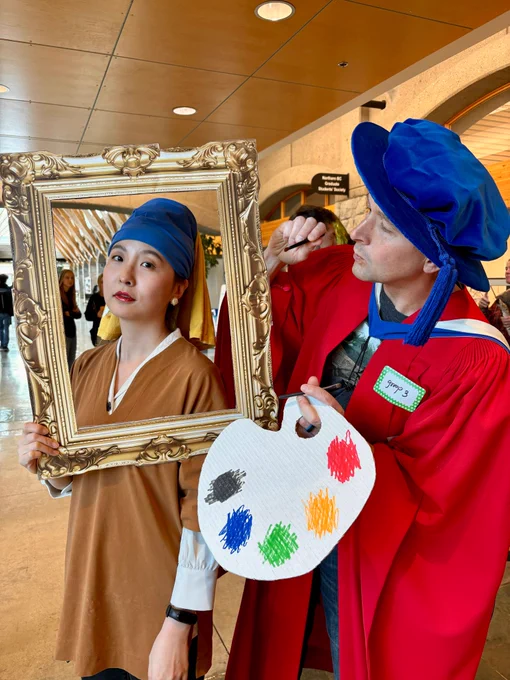 Costume duo depicting Vermeer's "Girl with a pearl earring"