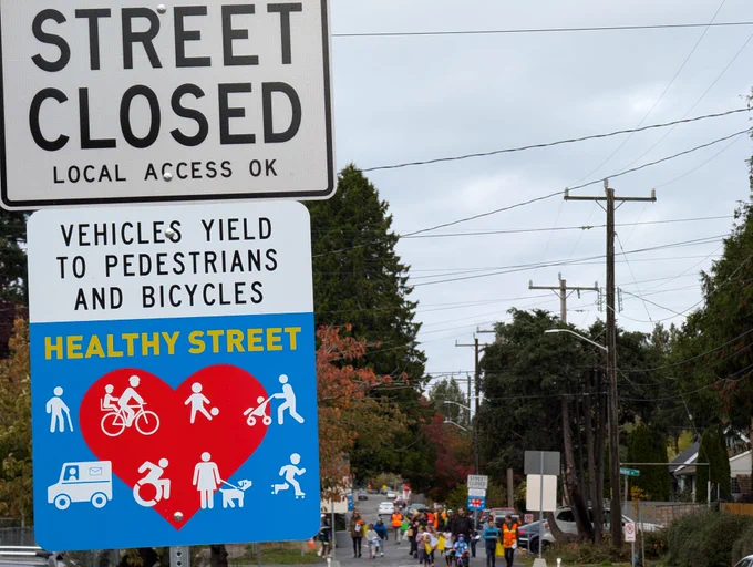 A Healthy Street sign. Due to legal requirements, the sign must say "Street Closed," but this allows people to walk and bike on the street without limitation. Healthy Streets allow local access while encouraging neighbors to use the space for activities, gatherings, and more.