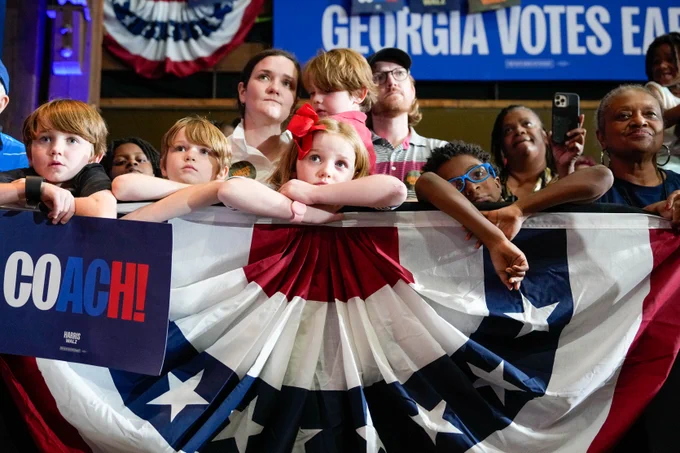 Children at a rally for Governor Walz.