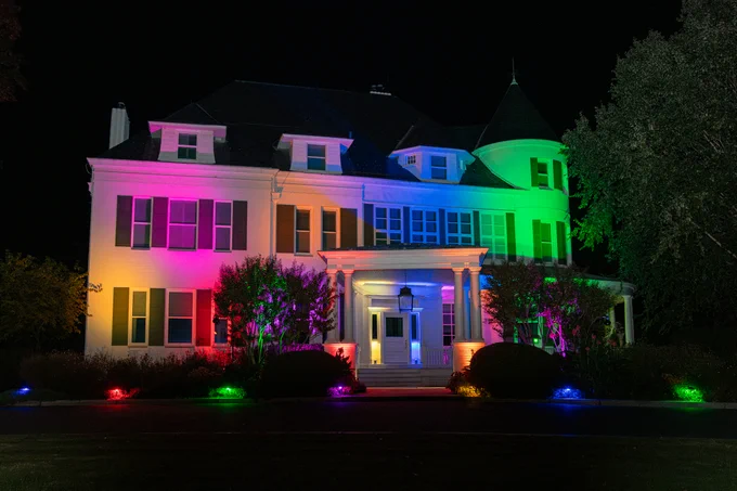 The Vice President's Residence illuminated by colors for Diwali.