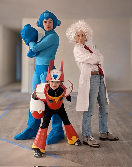 MatPat dressed as Mega Man, Stephanie dressed as Dr. Wily, and Ollie dressed as Zero