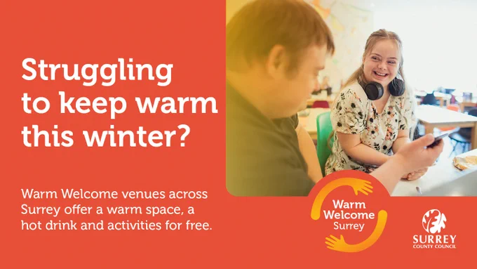 An image of two people sitting together at a table. One of them is smiling. 
Text reads: 
Warm Welcome Surrey. 
Struggling to keep warm this winter? 
Warm Welcome venues across Surrey offer a warm space, a hot drink and activities for free