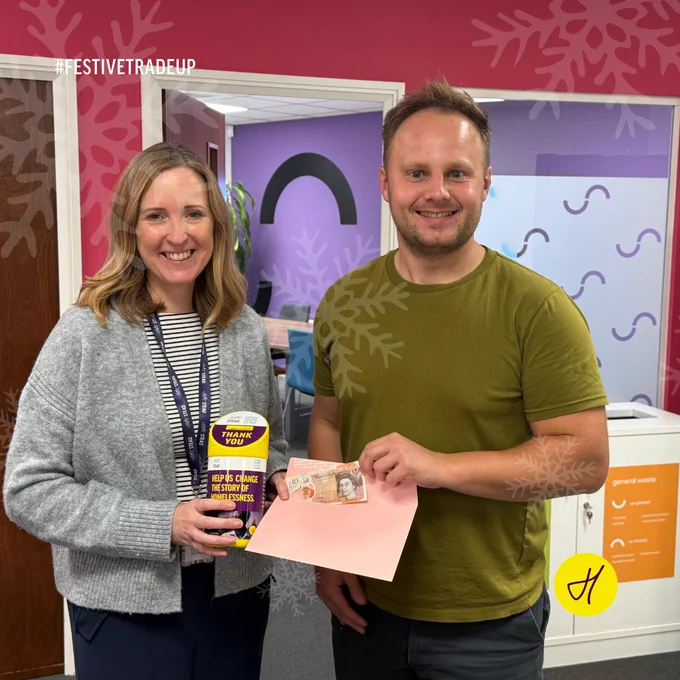 Lucy Parish gives Flagship Group Finance Manager Ben Rout £10 to get him started on the challenge