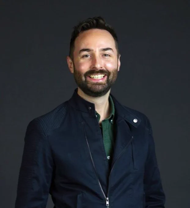 Photograph of Dr Brady Robards smiling