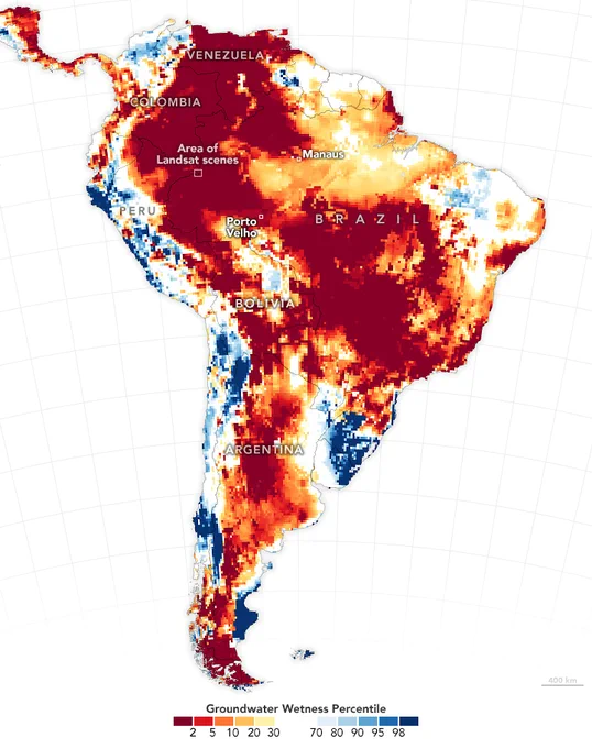 Map of South America with a data overlay showing groundwater wetness percentile. The map is predominately red and orange with some blue and white spots mostly along the western coast.