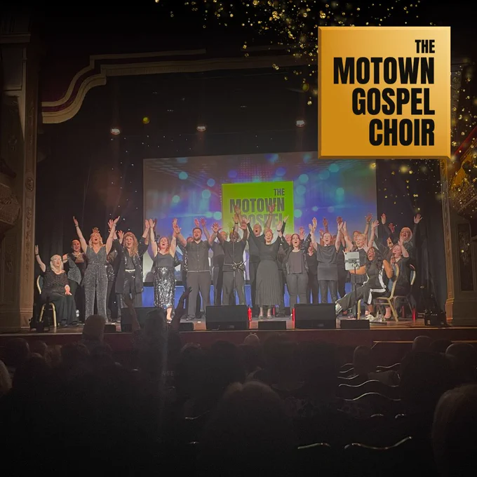 The Motown Gospel Choir on stage at City Varieties Music Hall accompanied by their logo.