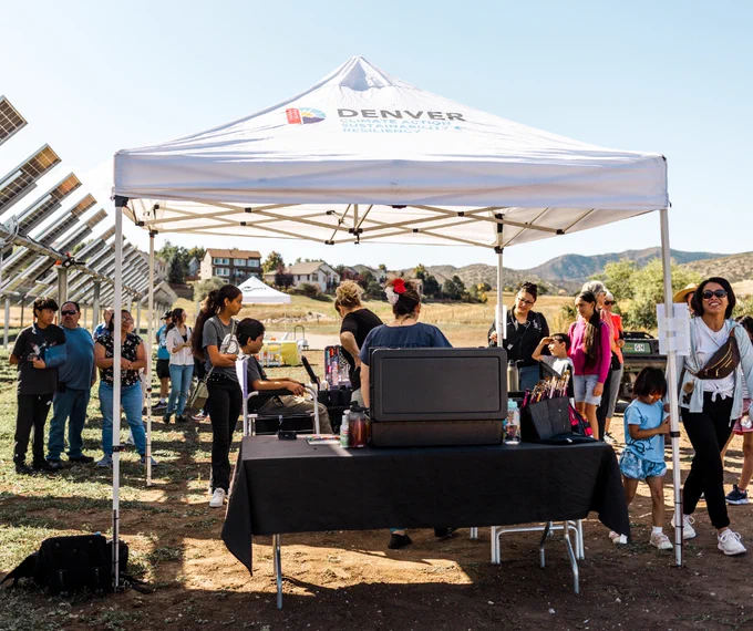 A group of people waiting to start the tour of Denver's newest solar garden and agrivoltaic demonstration at Denver Botanic Gardens Chatfield Farms.