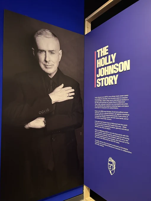 A photo of Holly Johnson on a wall