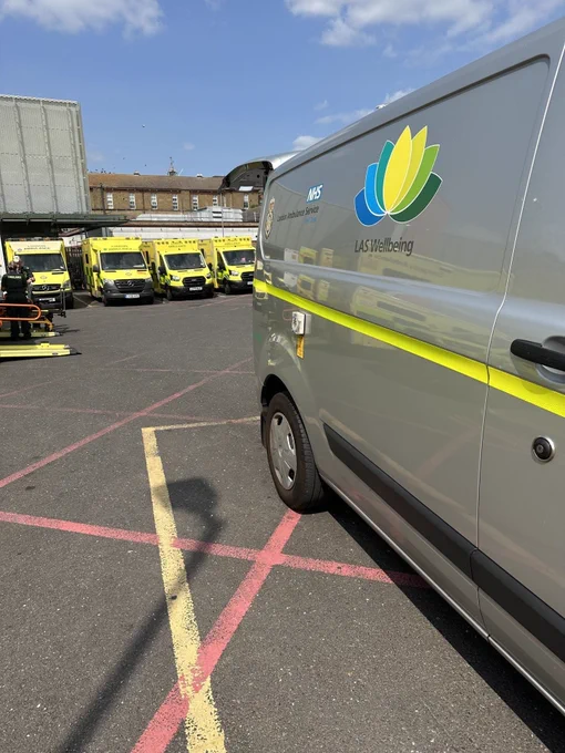 LAS well-being truck parked near ambulances.