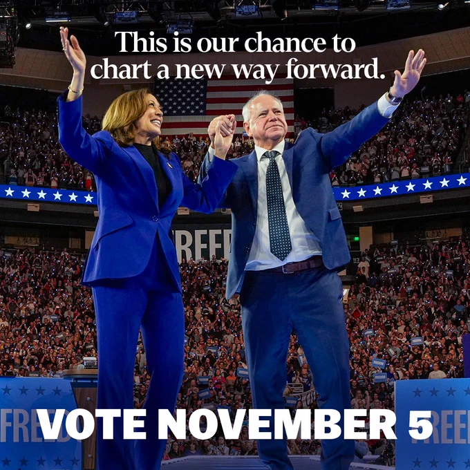 Vice President Kamala Harris and Governor Tim Walz hold hands and wave to a rally crowd. Text reads, "This is our chance to chart a new way forward. Vote November 5"