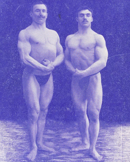 Two strong men printed in dark blue flex their arm muscles while wearing only thongs. From the 15 September 1906 issue of “La Culture Physique”. S1104 