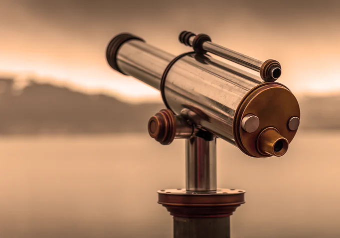 A telescope points towards the horizon. Photo by LN_photoart on Pixabay.