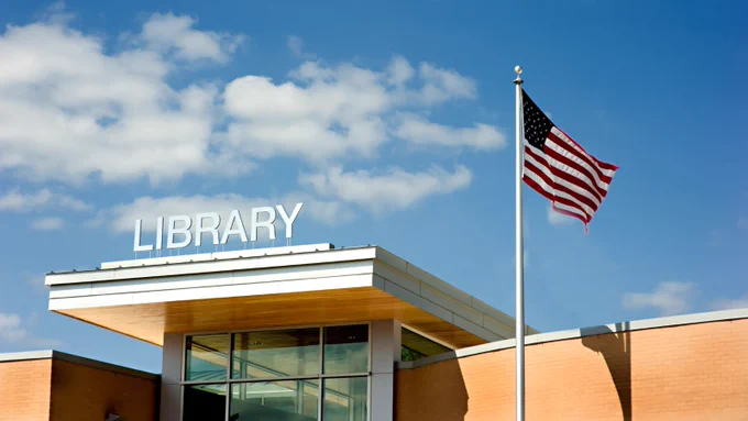 US Library flying the American flag