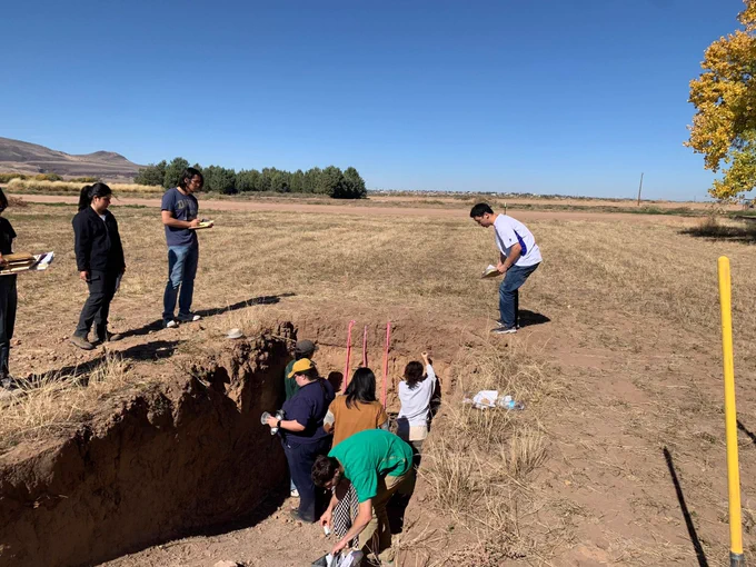 Students in soil pit characterizing soil properties