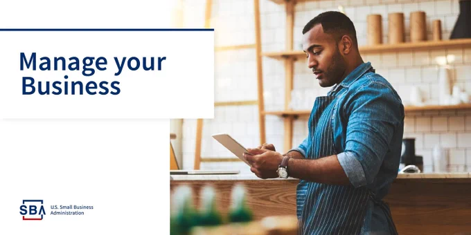 Photo of a business owner looking at a tablet and the words "Manage your business"