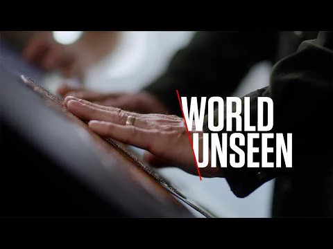 Close-up of a person's hands touching a photograph, with the text 'World Unseen' displayed in the lower right corner.

The photograph on display in the video is part of Canon Ambassador Brent Stirton's “Rhino Wars” series, and depicts the world’s last male northern white rhinoceros, standing in the Kenyan savanna, flanked by the heavily armed men paid to protect him.

Using the Canon PRISMAelevate XL software and the Arizona printer series, Brent's photograph becomes a tactile experience, helping blind conservationist Lawrence Gunther to conjure the picture in his mind's eye.
